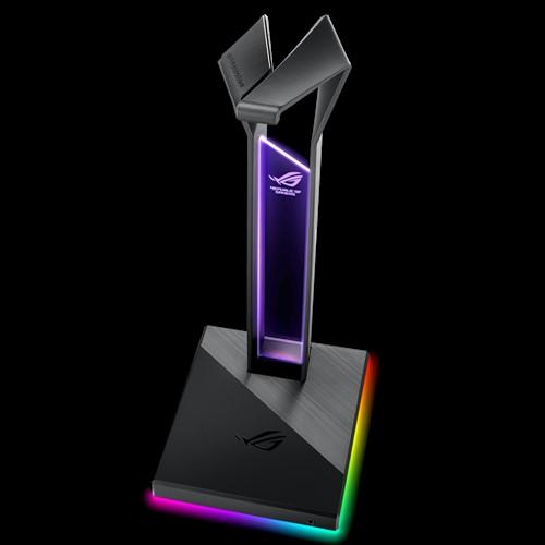 ASUS ROG THRONE/AS headset stand with RGB lighting and dual USB ports, showcasing its sleek design and immersive audio features.